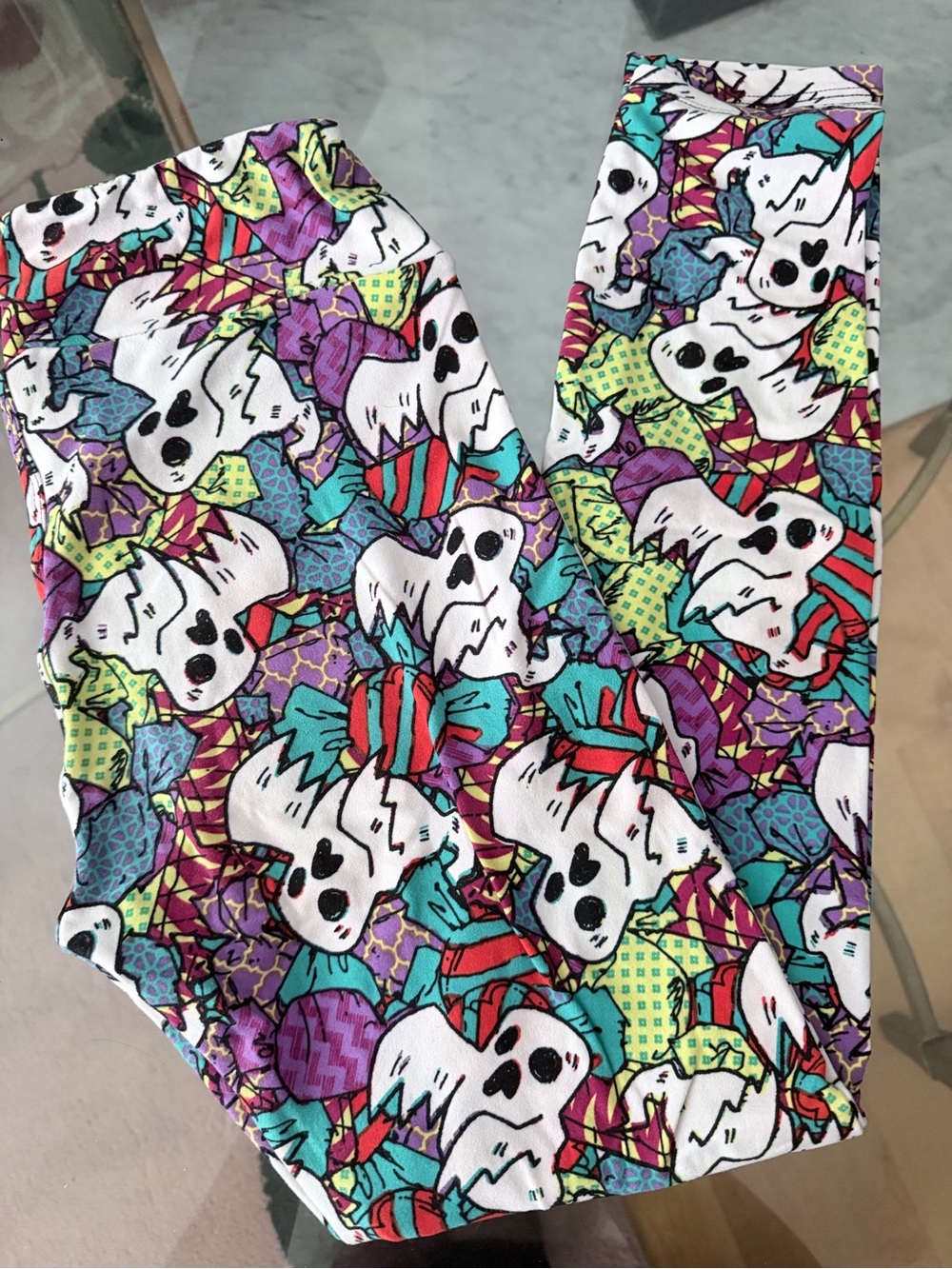 LuLaRoe Leggings with White Ghosts and Teal, Purple, Red Accents